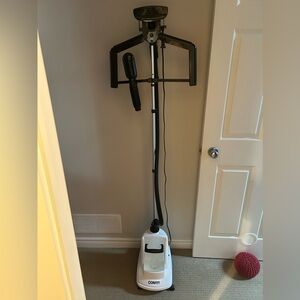 Conair Deluxe clothes steamer with attachments.